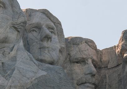 A close up of the faces on mount rushmore